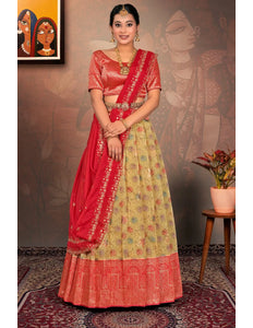 Woman in a red and yellow traditional lehenga choli