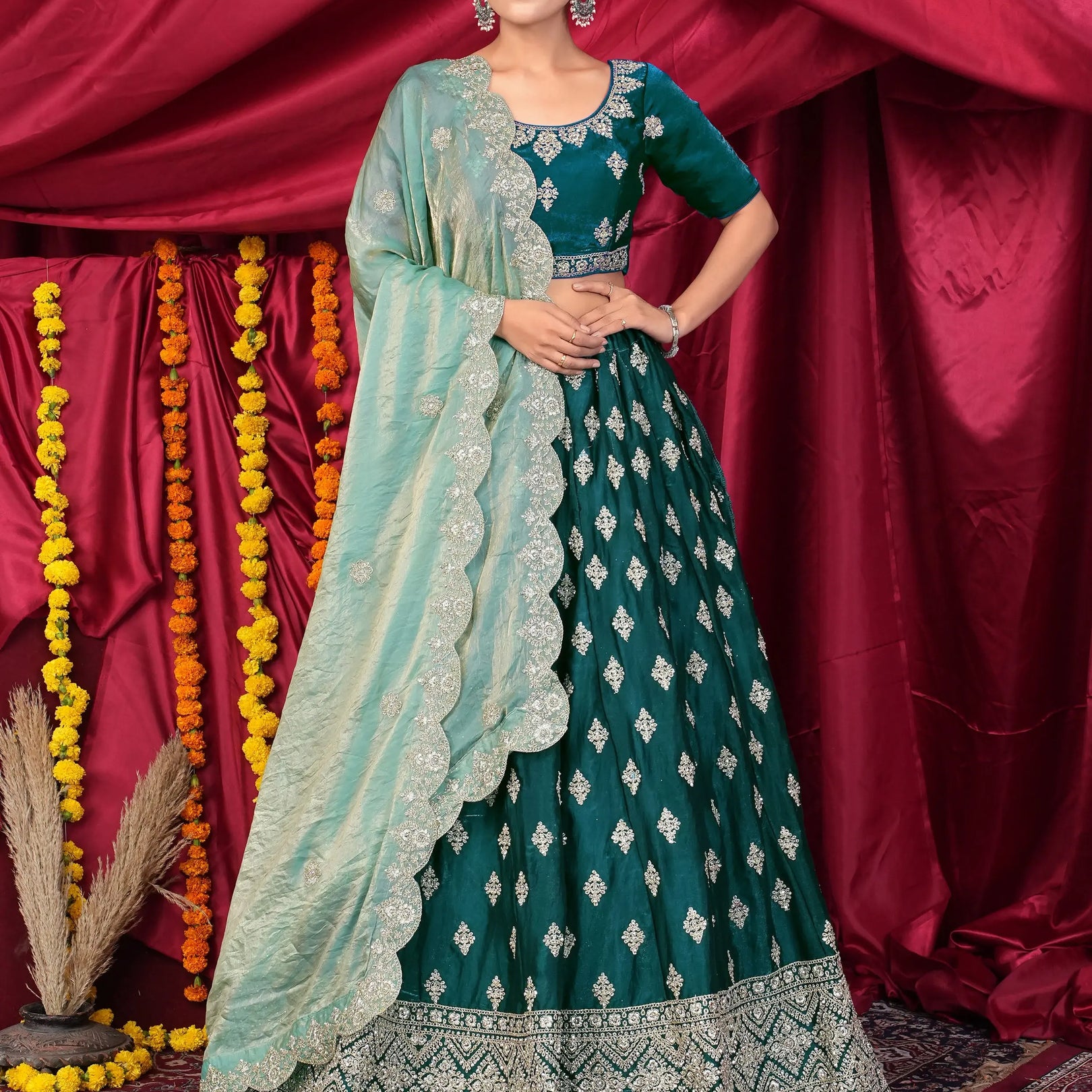 Woman in traditional Green Embroidered Lehenga Choli