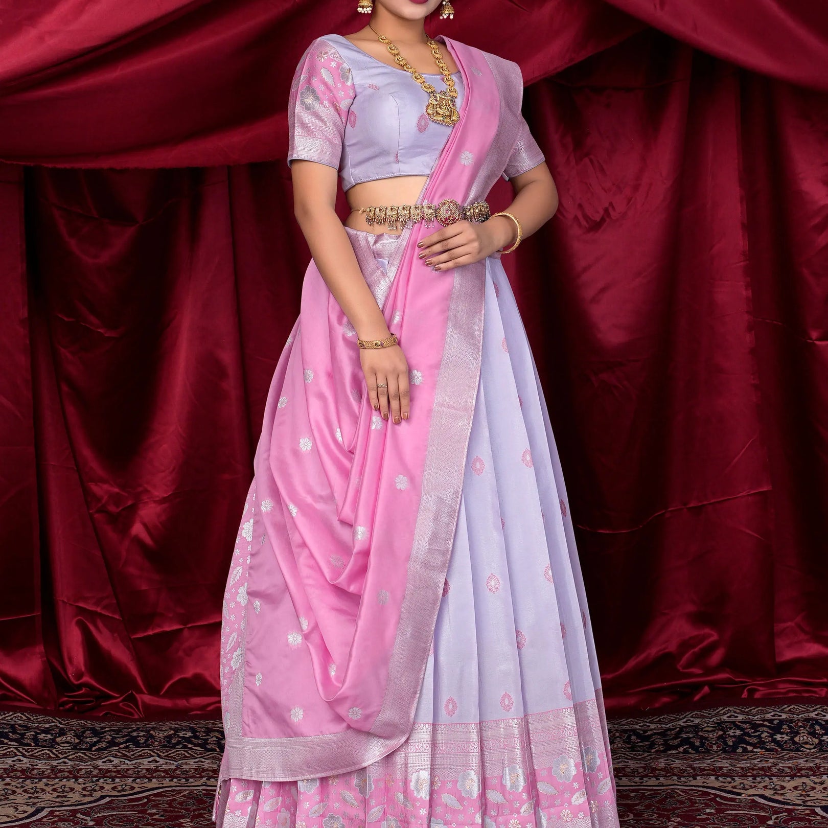 Woman wearing a Lavender and Pink lehenga choli