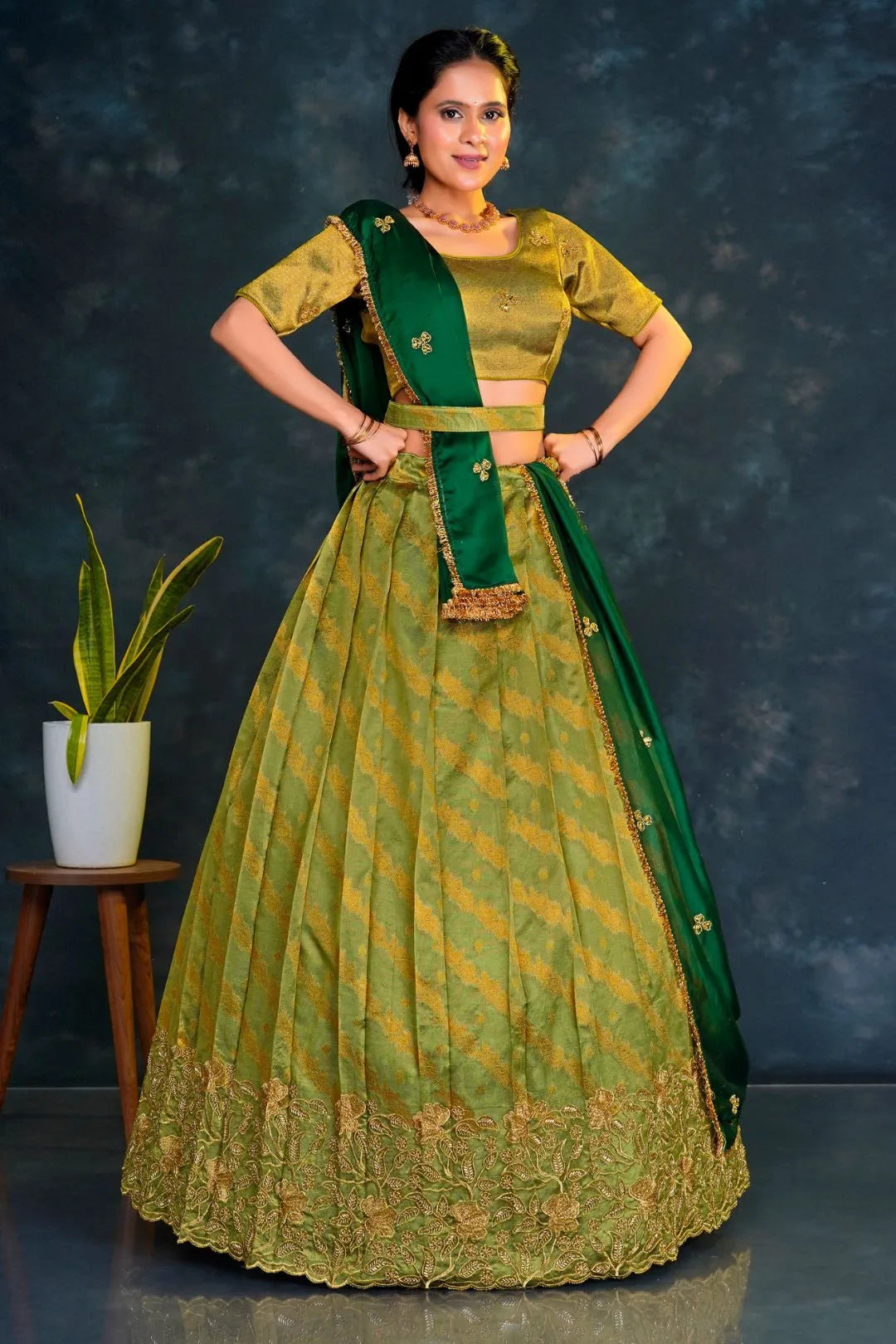 Mehendi Tissue Silk Lehenga Choli With Zari Woven