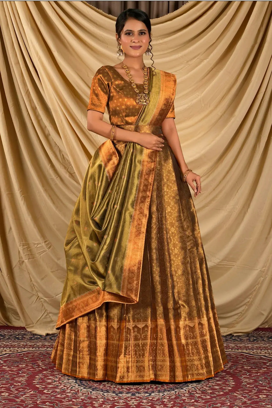 Woman wearing a traditional patterned lehenga choli with dupatta