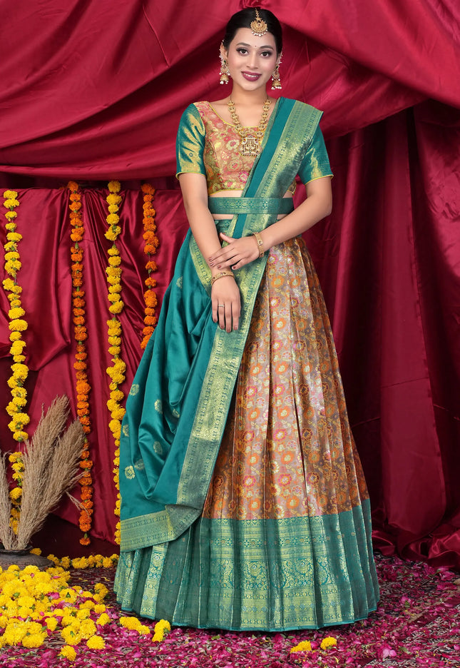 Woman in traditional green and gold lehenga choli
