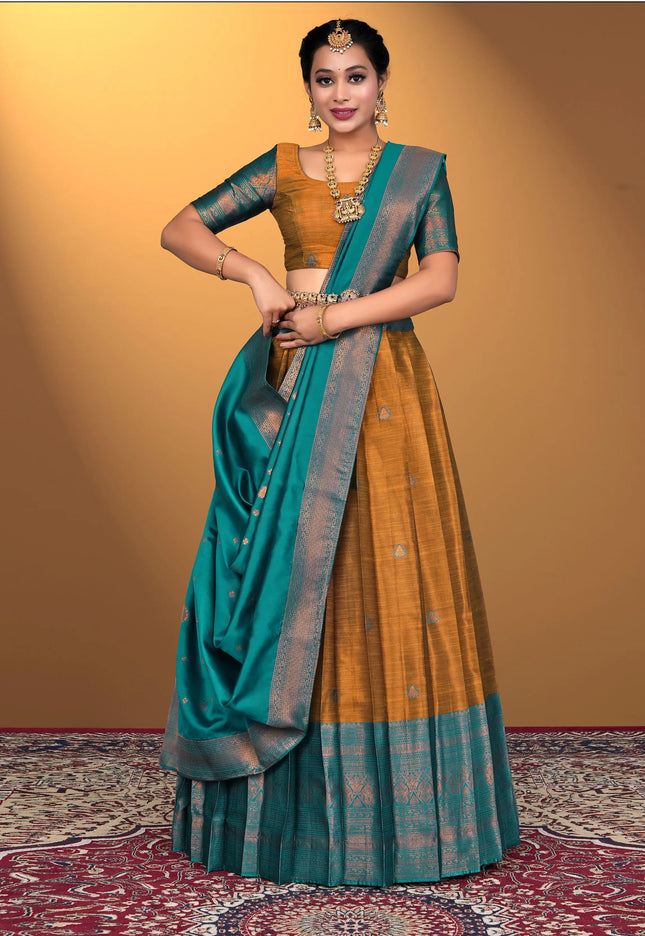 Woman wearing a traditional lehenga choli with a yellow and blue color