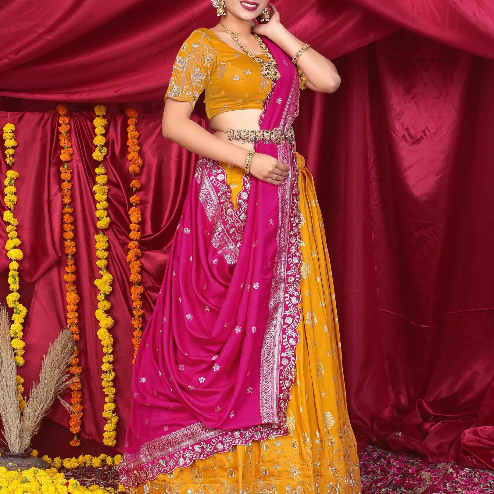 Woman in a yellow and pink traditional outfit