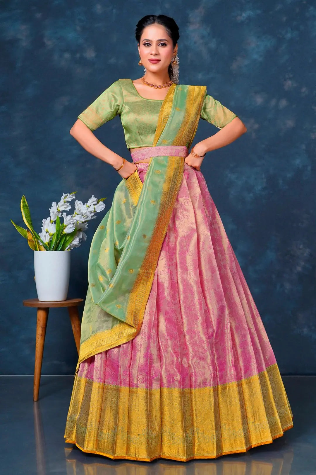 Woman wearing a traditional lehenga choli with dupatta
