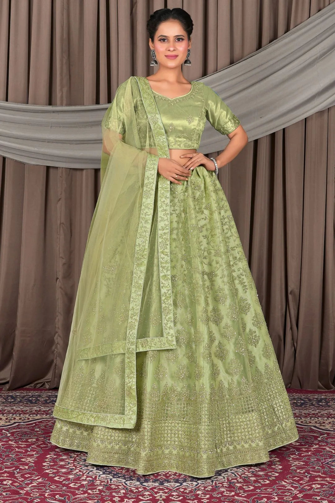 Pista Designer Net Lehenga Choli For Women