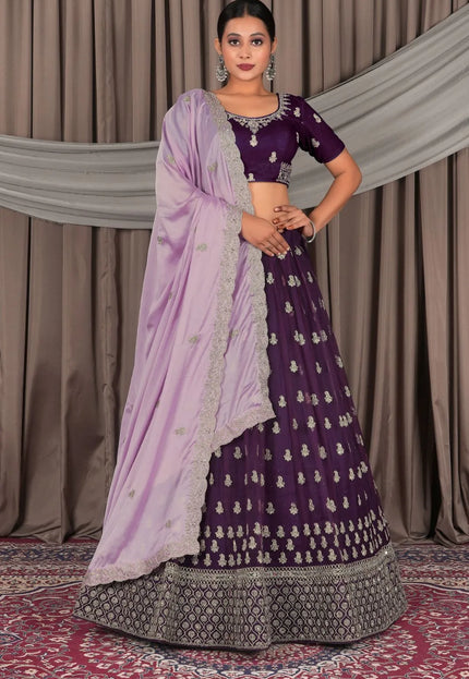 Purple Net Designer Lehenga Choli with Rangoli Dupatta