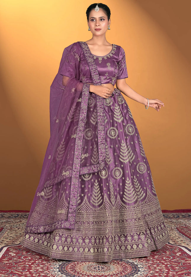 Woman wearing a purple embroidered traditional outfit