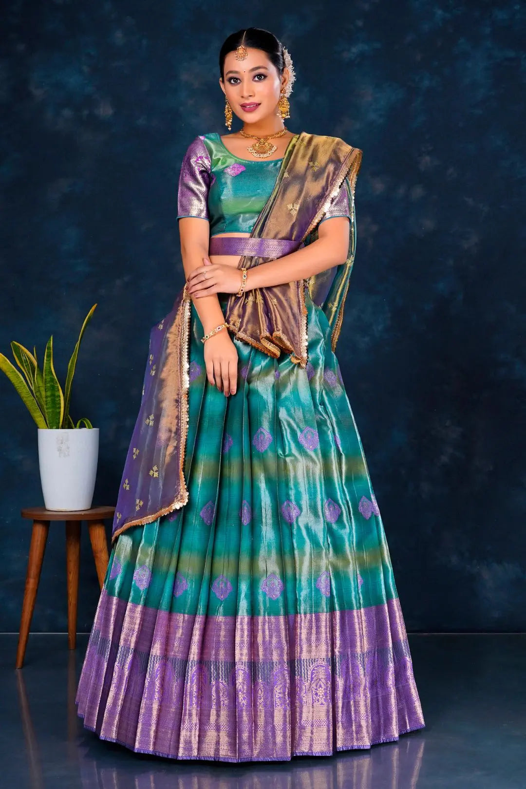 Woman wearing a traditional lehenga choli with dupatta