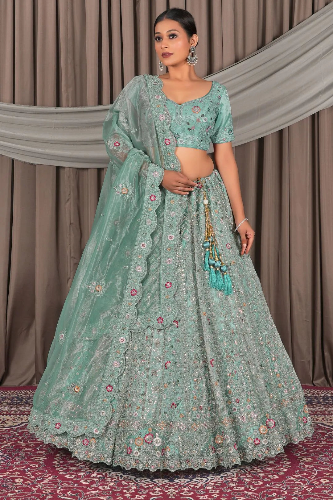 Sea Green Party Wear Embroidered Twill Net Lehenga Choli For Women