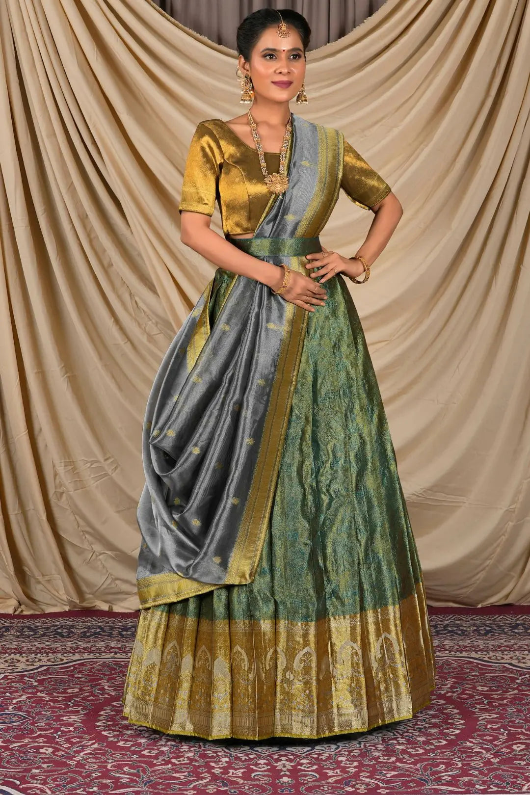 Woman wearing a traditional lehenga with a gold blouse