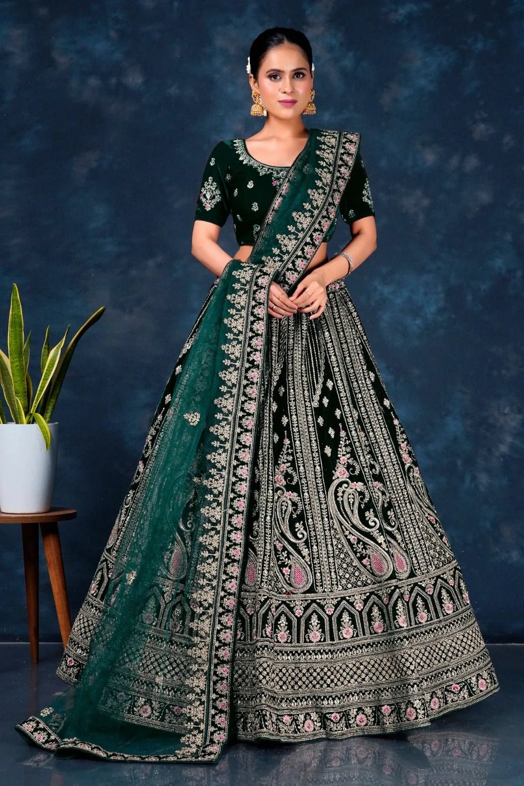 Green Heavy Embroidered Bridal Lehenga in Velvet - Gajiwala