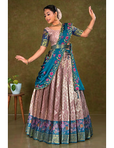 Woman in a traditional lehenga choli with floral patterns