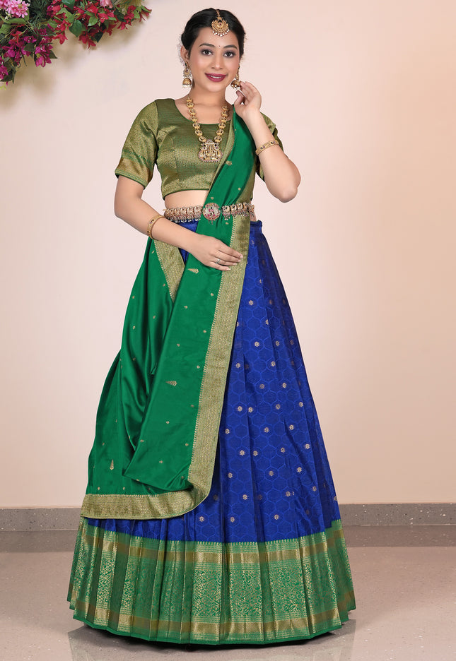 Woman wearing a Blue and green lehenga choli