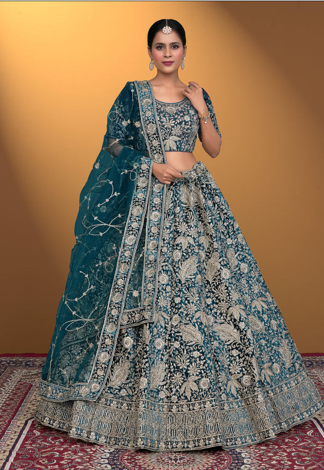 Woman wearing a traditional blue embroidered outfit
