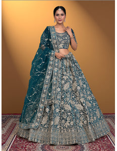 Woman wearing a traditional blue embroidered outfit