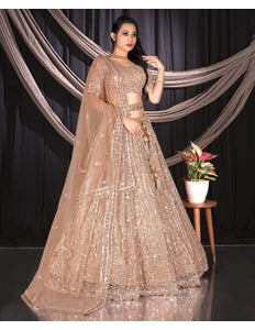 Woman in a beige embroidered traditional outfit