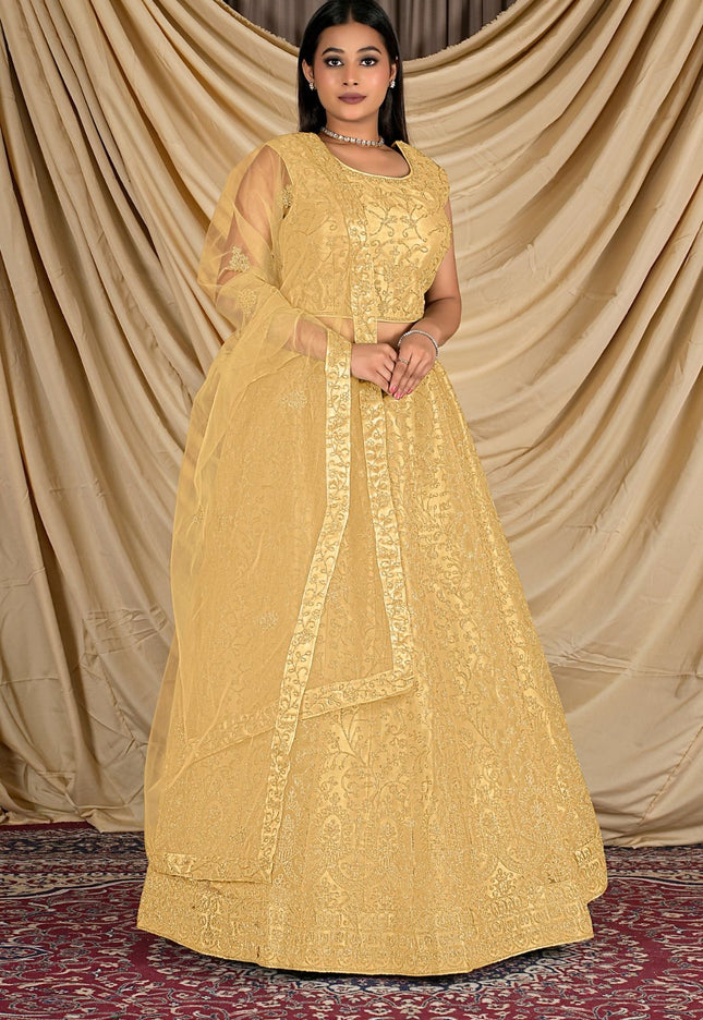 Woman wearing a yellow embroidered traditional outfit