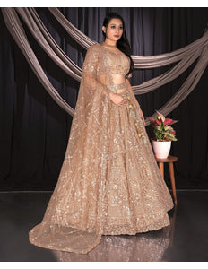 Woman in a beige embroidered traditional outfit