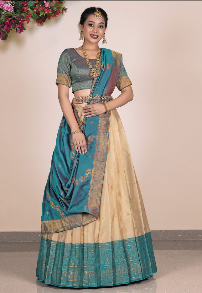 Woman wearing a traditional lehenga with a blue and beige