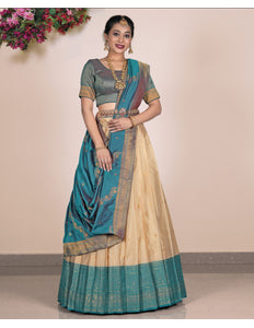 Woman wearing a traditional lehenga with a blue and beige