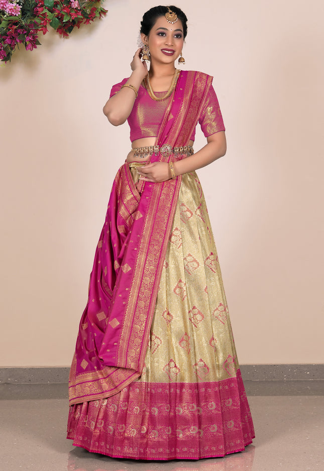 Woman wearing a Chiku and Pink Lehenga Choli