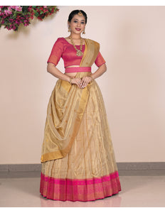 Woman wearing a traditional Lehenga with a pink blouse