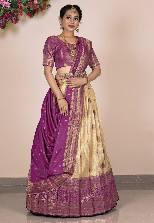 Woman wearing a traditional purple and beige lehenga choli
