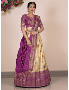 Woman wearing a traditional purple and beige lehenga choli