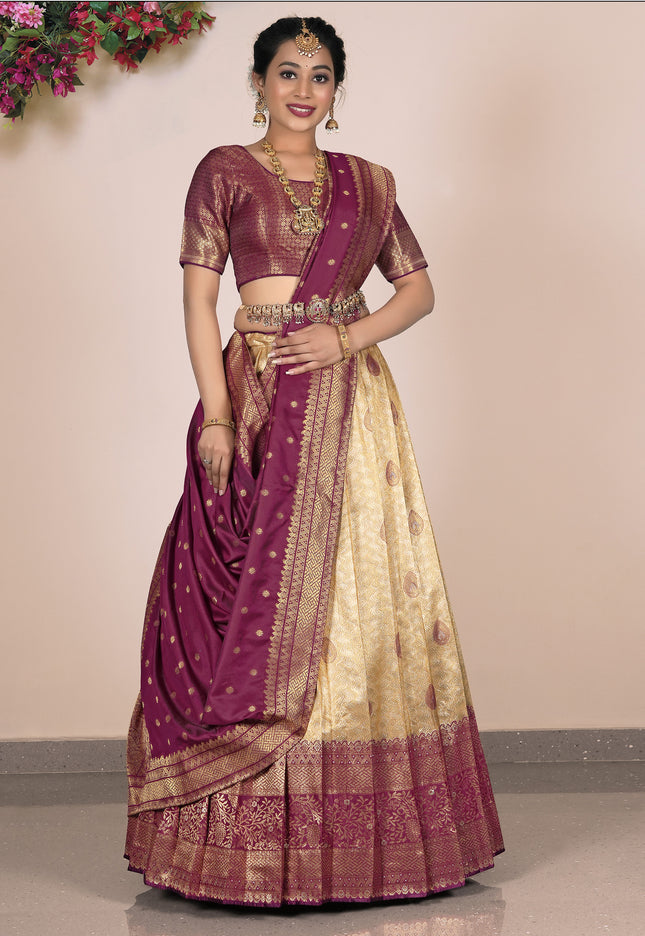 Woman wearing a traditional maroon and beige lehenga choli