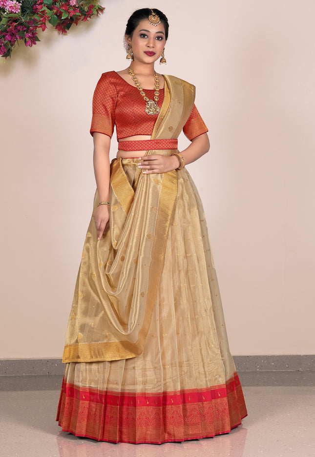 Woman wearing a traditional with a red blouse and beige skirt