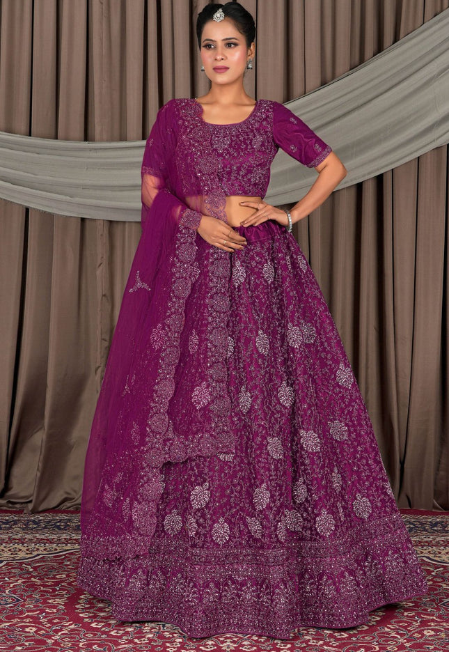 Woman wearing a traditional purple embroidered outfit