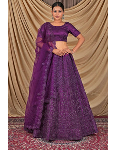 Woman wearing a purple traditional outfit