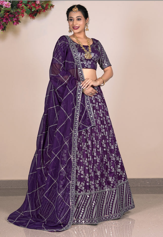 Woman wearing a purple lehenga choli