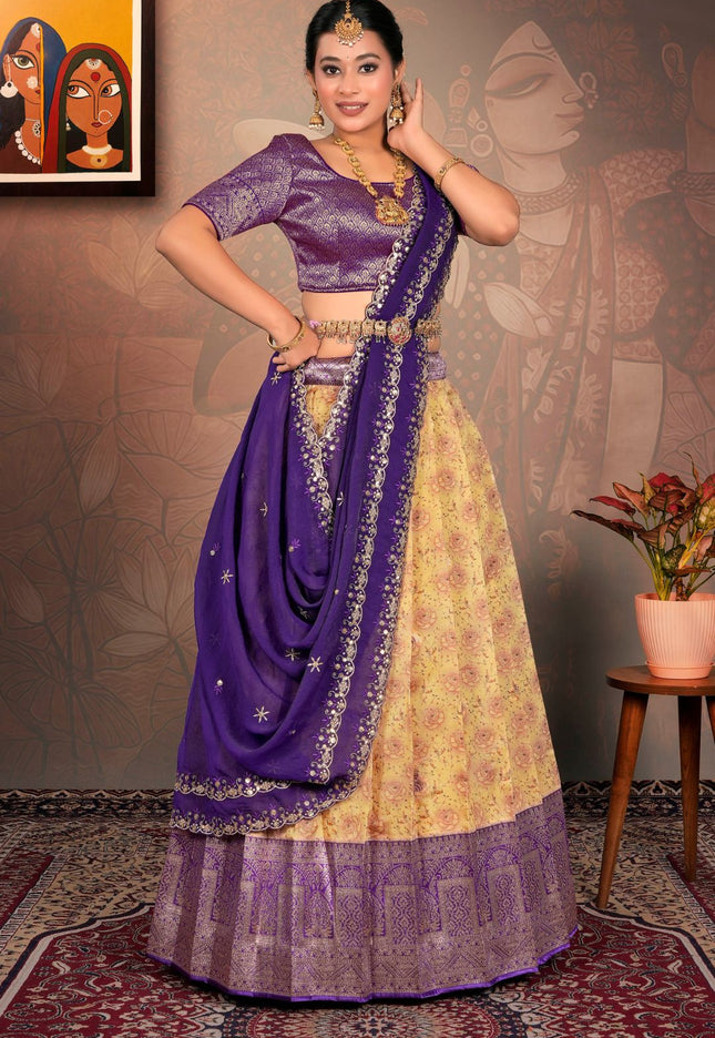 Woman in a traditional purple and lemon lehenga choli with dupatta