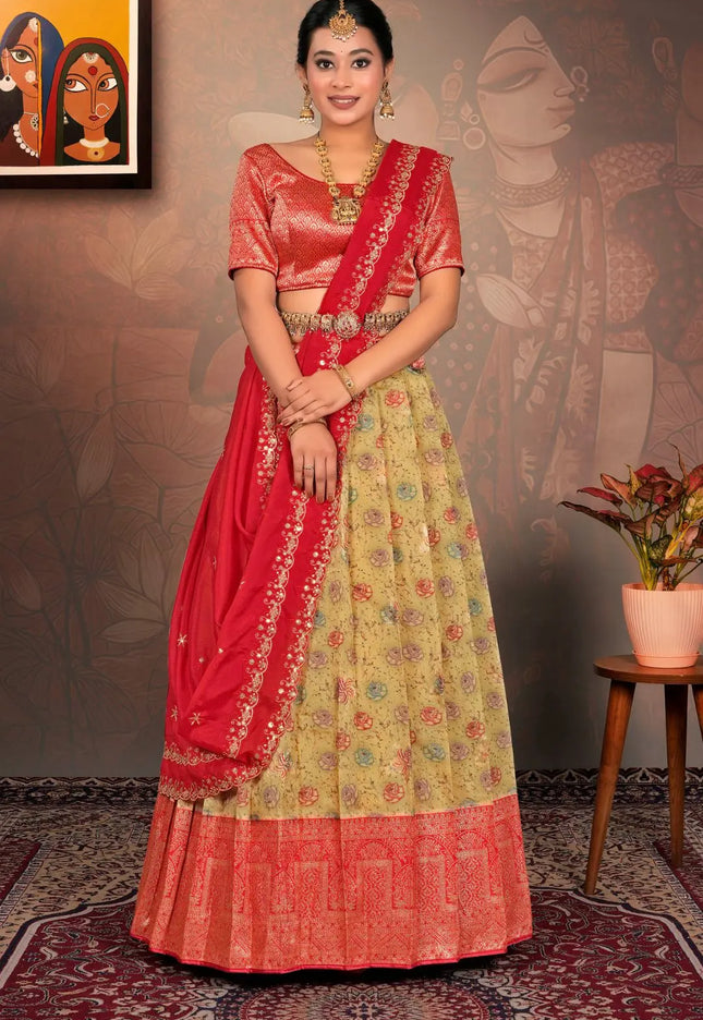 Woman in a red and yellow traditional lehenga choli