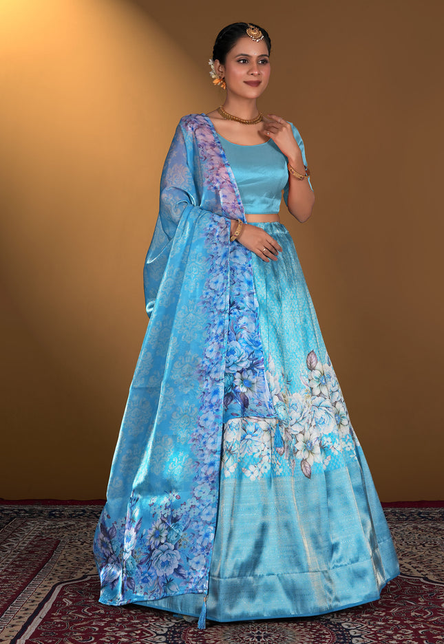 Woman wearing a blue floral lehenga choli