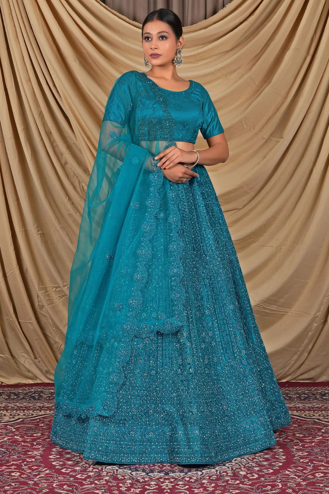 Firozi Sequins Embroidered Net Lehenga Choli