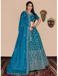 Woman wearing a blue lehenga choli