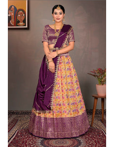 Woman wearing a traditional purple and yellow lehenga choli with a floral pattern