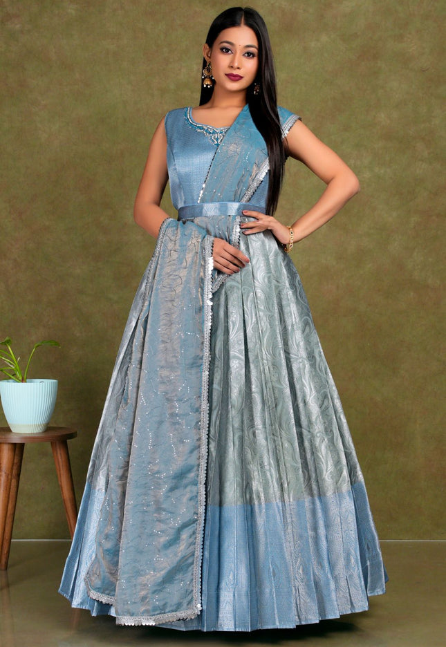 Woman wearing a blue and gray dress lehenga choli with dupatta