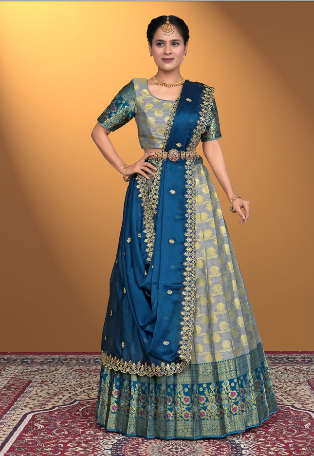 Woman wearing a traditional gray lehenga choli