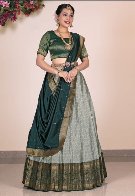 Woman wearing a Gray Lehenga with a green blouse