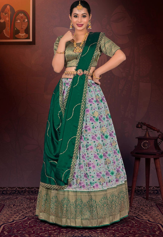 Woman in a traditional gray and floral lehenga choli