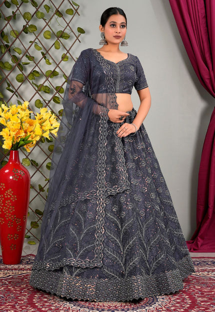Woman wearing a dark gray embroidered lehenga