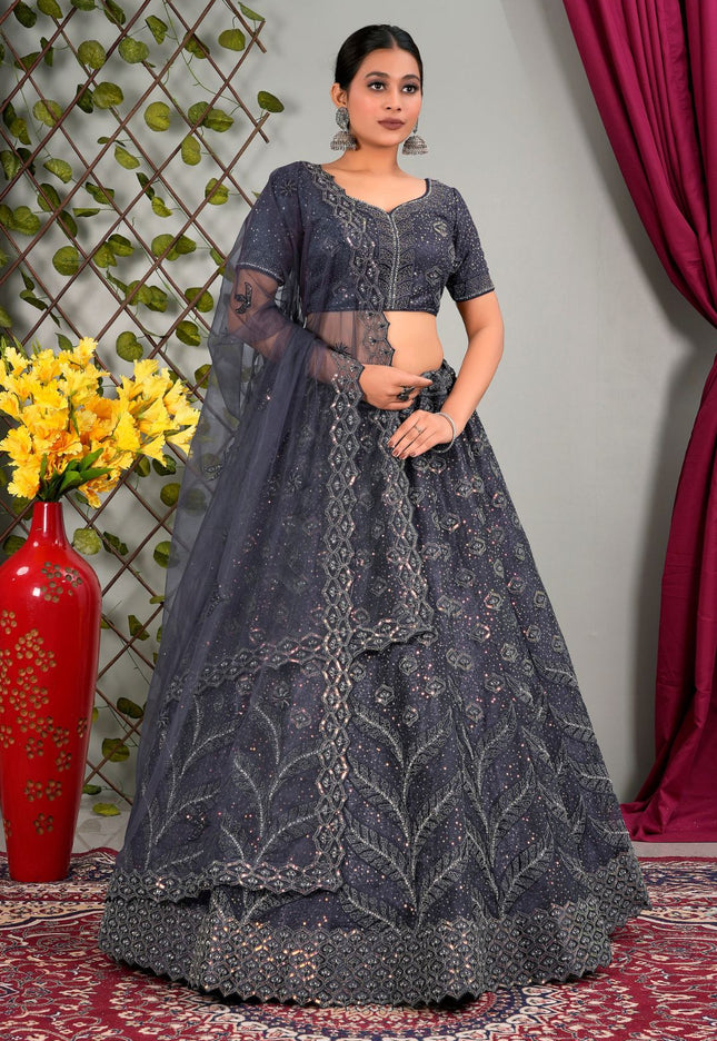 Woman wearing a dark gray embroidered lehenga