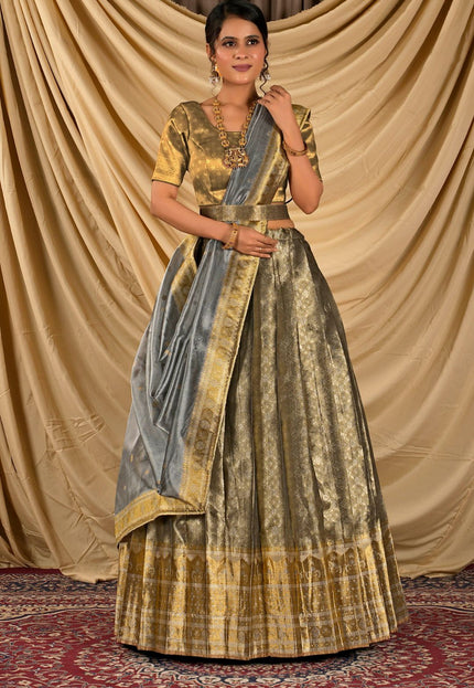 Woman wearing a traditional outfit with a lehenga choli with dupatta