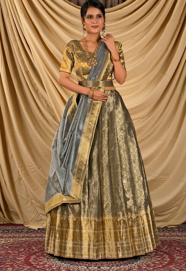 Woman wearing a traditional outfit with a lehenga choli with dupatta