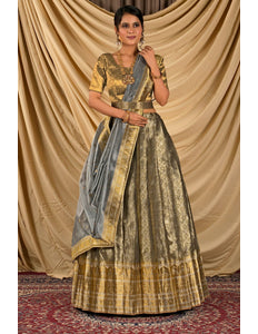 Woman wearing a traditional outfit with a lehenga choli with dupatta