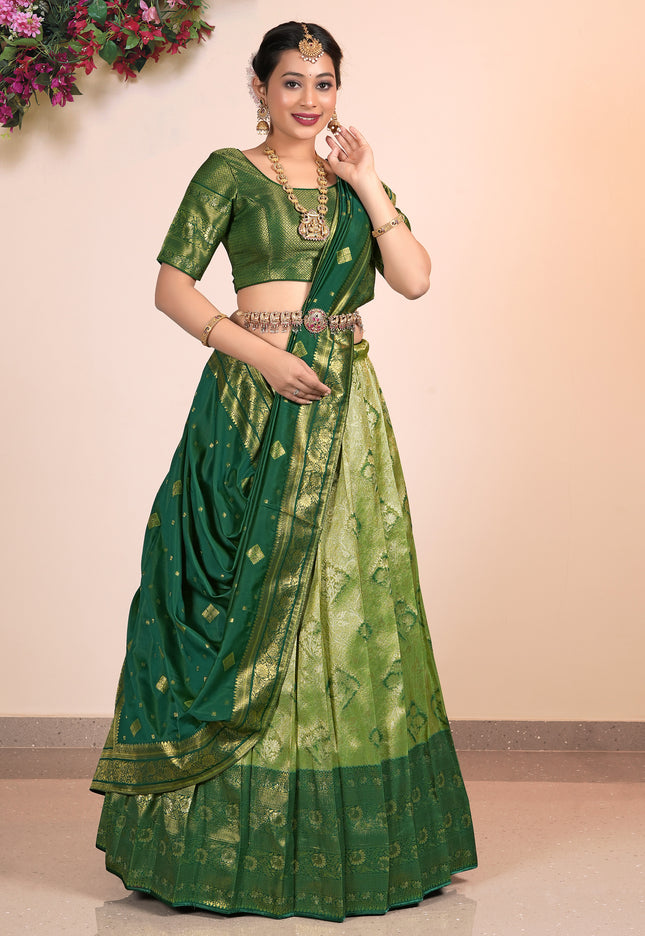 Woman wearing a green Lehenga Choli with a matching blouse